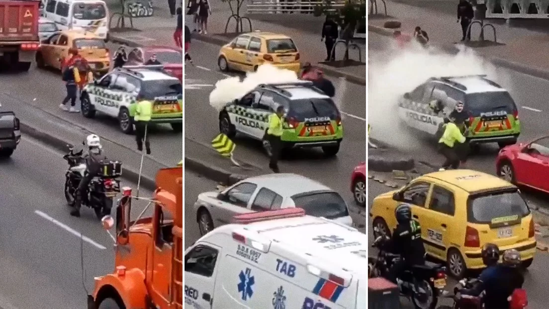 Encapuchados atacan una patrulla y a un policía en una marcha estudiantil en Bogotá